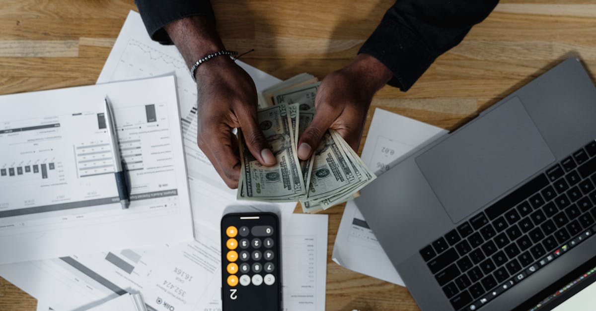 Accountant reviewing overdue invoices for potential write-off